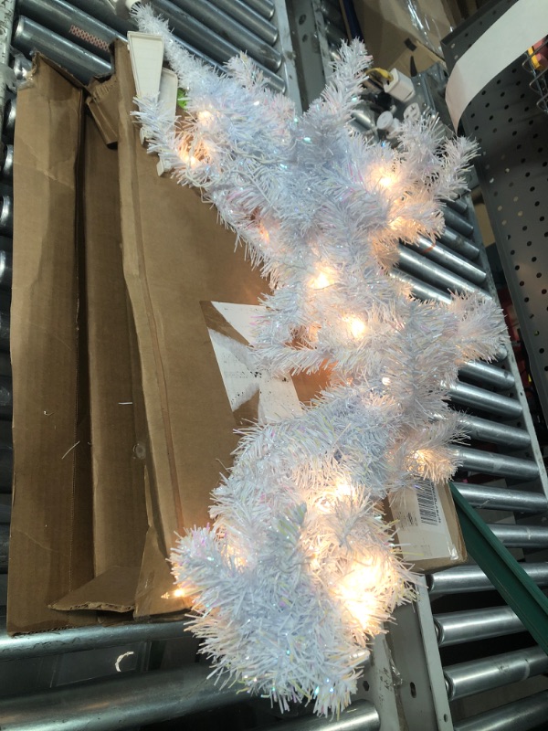 Photo 2 of ***MINOR DAMAGE TO BASE*PICTURED***
National Tree Company Pre-Lit Artificial Christmas Tree, White Tinsel, White Lights, Includes Stand, 4 feet