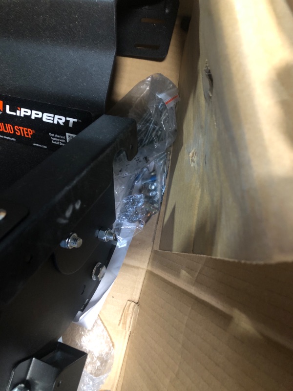 Photo 1 of Lippert Components 733931 Solid Step Quad Step for RV and Travel Trailer Entry Doorway Black, 26-inch 