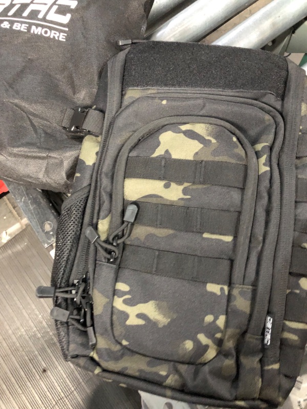 Photo 1 of DBTAC Tactical Sling Bag Compact Chest Pack Small, Full Size Concealed Carry Shoulder Bag for Range, Travel, Outdoor Sports Black Camo