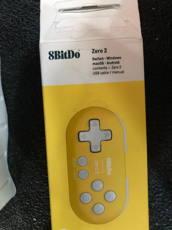 Photo 2 of 8Bitdo Zero 2 Bluetooth Key Chain Sized Mini Controller for Nintendo Switch, Windows, Android and macOS (Yellow Edition)