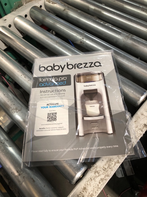 Photo 1 of New and Improved Baby Brezza Formula Pro Advanced Formula Dispenser Machine - Automatically Mix a Warm Formula Bottle Instantly - Easily Make Bottle with Automatic Powder Blending