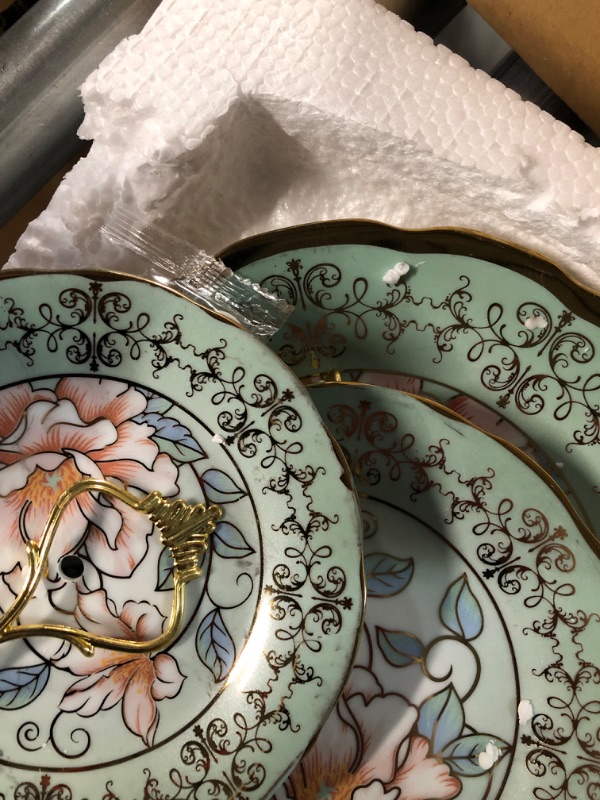 Photo 4 of ***USED - SCUFFED/SCRATCHED - LIKELY MISSING PARTS - UNABLE TO VERIFY FUNCTIONALITY***
Maxcheck 21 Pcs Ceramics Tea Set with Metal Holder and 3 Tier Ceramic Cake Stand (Green)