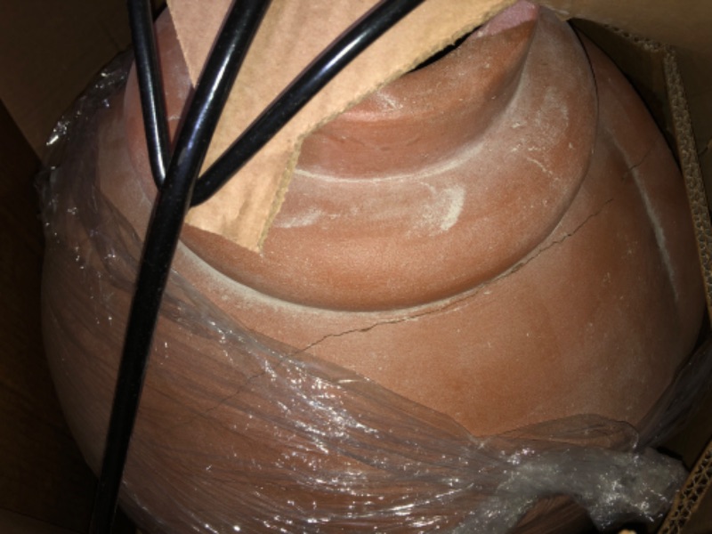 Photo 1 of **CRACKED SEE PHOTOS FOR REFERANCE**
Indoor and Outdoor Beige Clay Chimenea Scribbled Design Fire Pit with Metal Stand