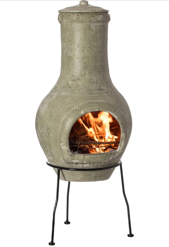 Photo 1 of **CRACKED SEE PHOTOS FOR REFERANCE**
Indoor and Outdoor Beige Clay Chimenea Scribbled Design Fire Pit with Metal Stand