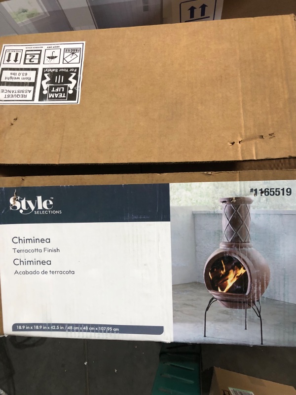 Photo 3 of **CRACKED SEE PHOTOS FOR REFERANCE**
Indoor and Outdoor Beige Clay Chimenea Scribbled Design Fire Pit with Metal Stand