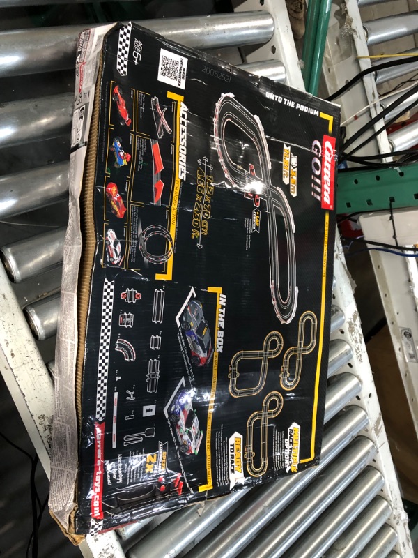 Photo 3 of Carrera GO!!! 62521 onto The Podium Electric Powered Slot Car Racing Kids Toy Race Track Set Includes 2 Hand Controllers and 2 Cars in 1:43 Scale