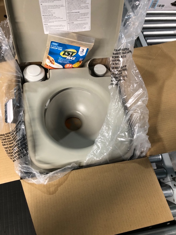 Photo 1 of Camco Portable Travel Toilet | Features Bellow-Type Flush and Sealing Slide Valve to Lock-in Odors and Protect against Leakage | Lightweight and Compact, 2.6 Gallon (41531)