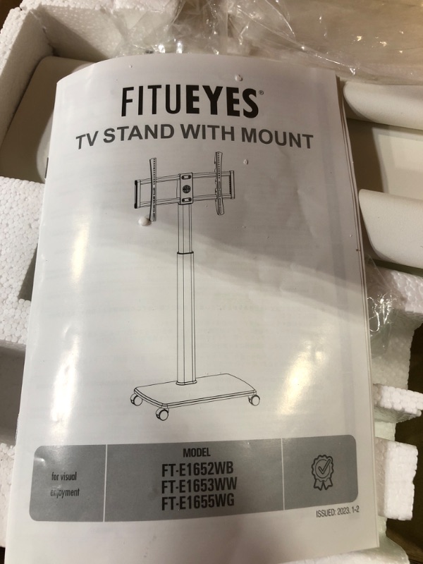 Photo 2 of FITUEYES Rolling TV Floor Stand for 32 to 65 70 Inch TVs,  Ivory White