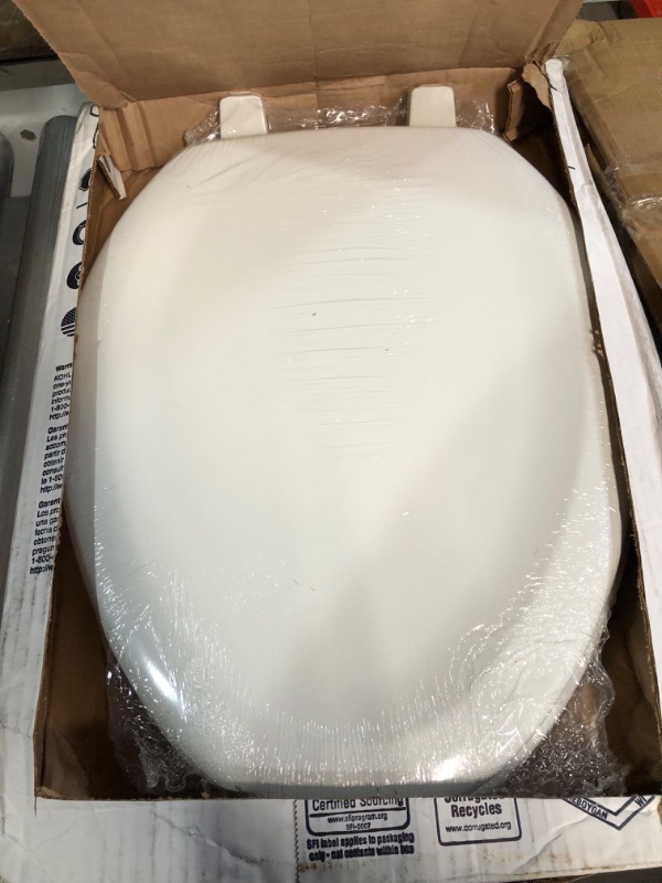 Photo 4 of ***MINOR DAMAGE*SCRATCH ON LID FRONT*PICTURED***
KOHLER K-4647-0 Stonewood Molded-Wood with Color-Matched Plastic Hinges Elongated Toilet Seat, White White Elongated