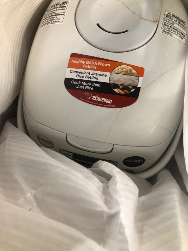 Photo 1 of ***PARTS ONLY/NON-RETURNABLE*DAMAGED*WONT TURN ON***
Zojirushi NS-WTC10 Micro-Computer Rice Cooker and Warmer 5.5 Cup, White