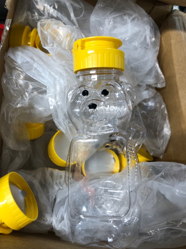 Photo 4 of 32 Pack Honey Bear Bottle with Straws Empty Plastic Cup Honey Jar Containers Bear Shaped Squeeze Bottle Storing and Dispensing Yellow Flip Top Lid Assistive Drink Cups Honey Bottles Jar (8oz)