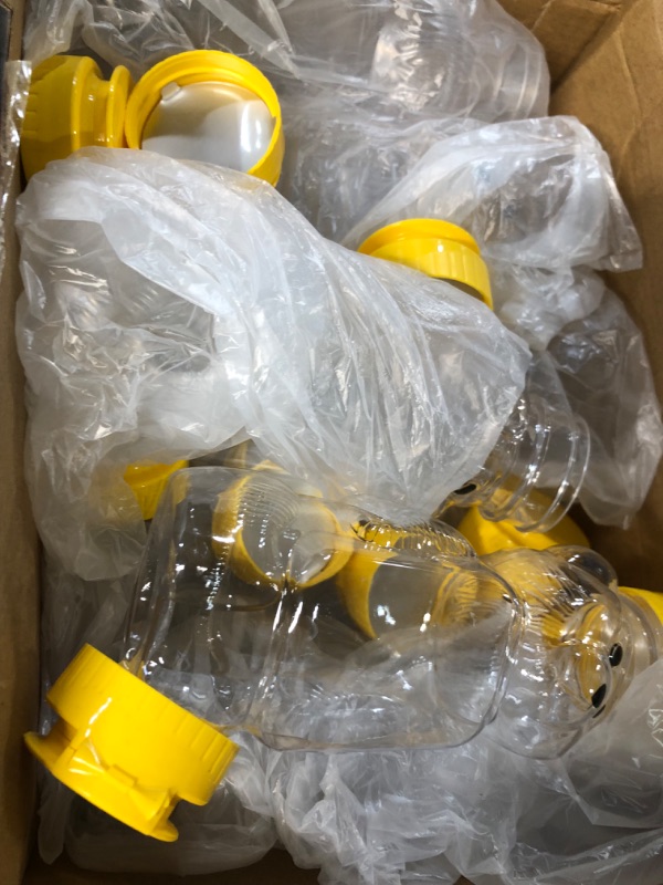 Photo 2 of 32 Pack Honey Bear Bottle with Straws Empty Plastic Cup Honey Jar Containers Bear Shaped Squeeze Bottle Storing and Dispensing Yellow Flip Top Lid Assistive Drink Cups Honey Bottles Jar (8oz)