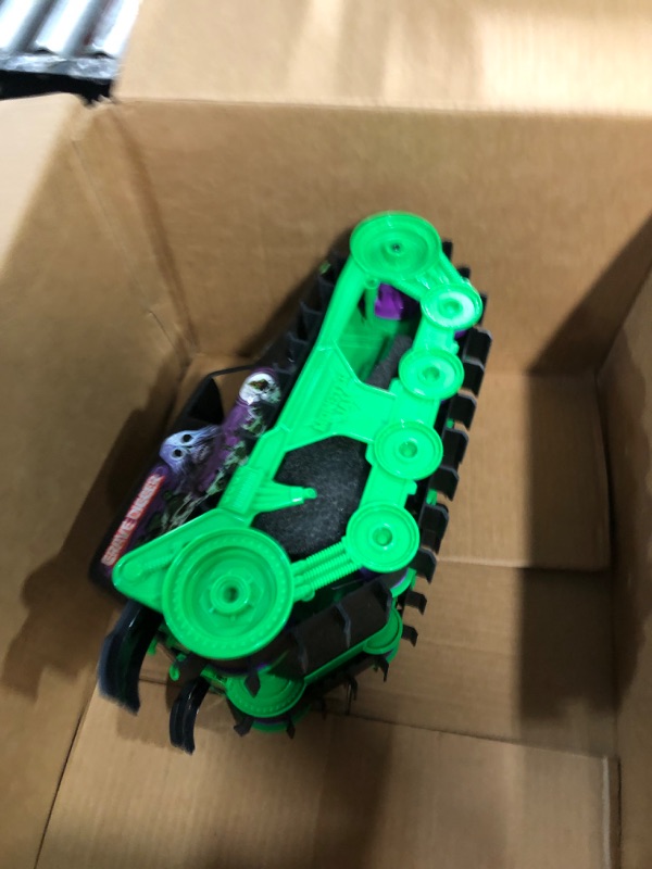 Photo 2 of **NONREFUNDABLE**FOR PARTS OR REPAIR**SEE NOTES**
Monster Jam, Official Grave Digger Trax All-Terrain Remote Control Outdoor Vehicle, 1:15 Scale, Kids Toys for Boys and Girls Ages 4 and up