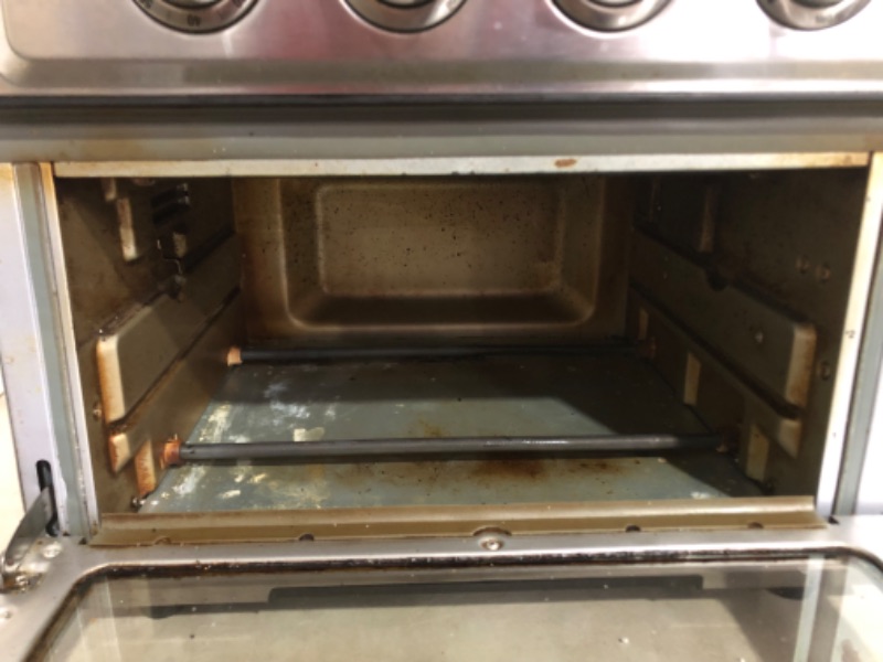 Photo 4 of ***MINOR DAMAGE**VERY USED**VERY DIRTY**ALL ACCESSORIES MISSING**SPACER ON THE BACK IS BENT***
Air Fryer + Convection Toaster Oven by Cuisinart, 7-1 Oven 