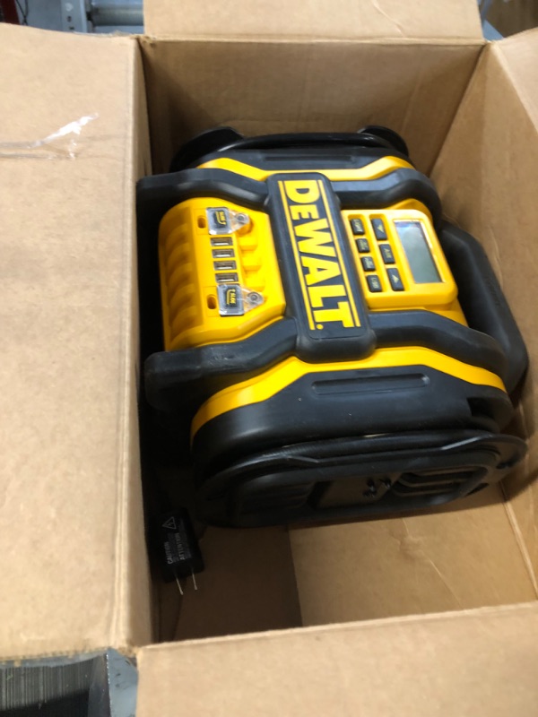 Photo 2 of DEWALT DXAEPS14 1600 Peak Battery Amp 12V Automotive Jump Starter/Power Station with 500 Watt AC Power Inverter, 120 PSI Digital Compressor, and USB Power , Yellow