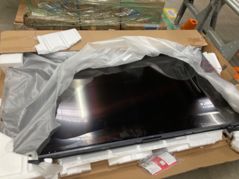 Photo 2 of **Damaged ** TCL 85-Inch Q65 QLED 4K UHD Smart TV with Google TV (85Q651G, 2024 Model) Dolby Vision, Dolby Atmos, HDR Pro+, Game Accelerator Enhanced Gaming, Voice Remote, Works with Alexa, Streaming Television