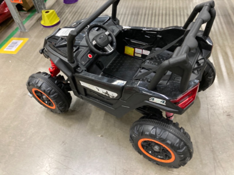 Photo 4 of ***FOR PARTS, NON-FUNCTIONAL*** 2 Seater Ride on Car for Kids, 24V Powered Electric Off-Road UTV Ride Toy, 4WD Electric Vehicle with Remote Control, LED Lights, Bluetooth, 3 Speeds, Horn, 2 Spring Suspension