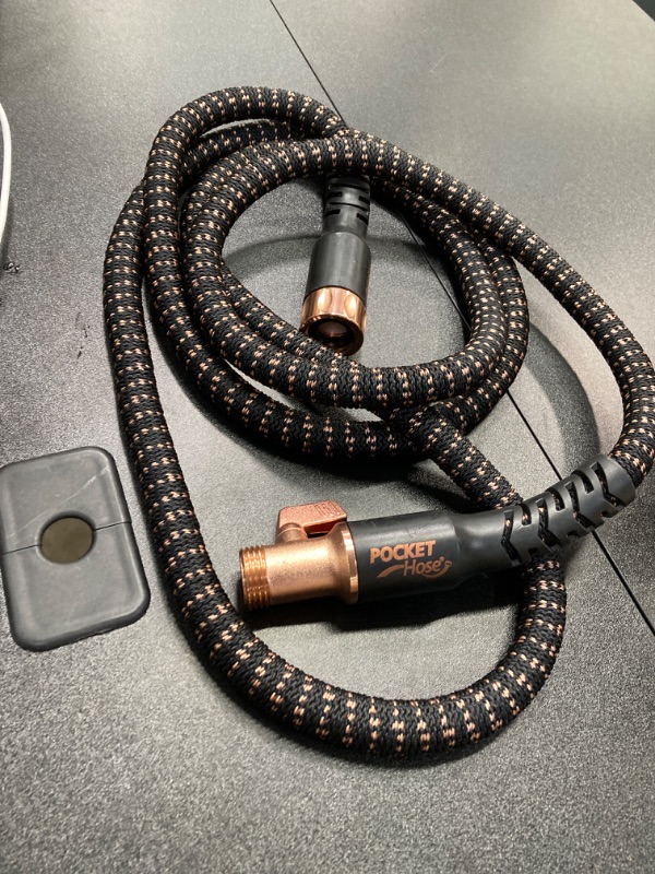 Photo 2 of Pocket Hose Copper Bullet Expandable Garden Hose w/10 Pattern Thumb Spray Nozzle AS-SEEN-ON-TV 100 FT 650psi 3/4 in Patented Lead-Free Ultra-Lightweight Solid Copper Anodized Aluminum Fittings No-Kink