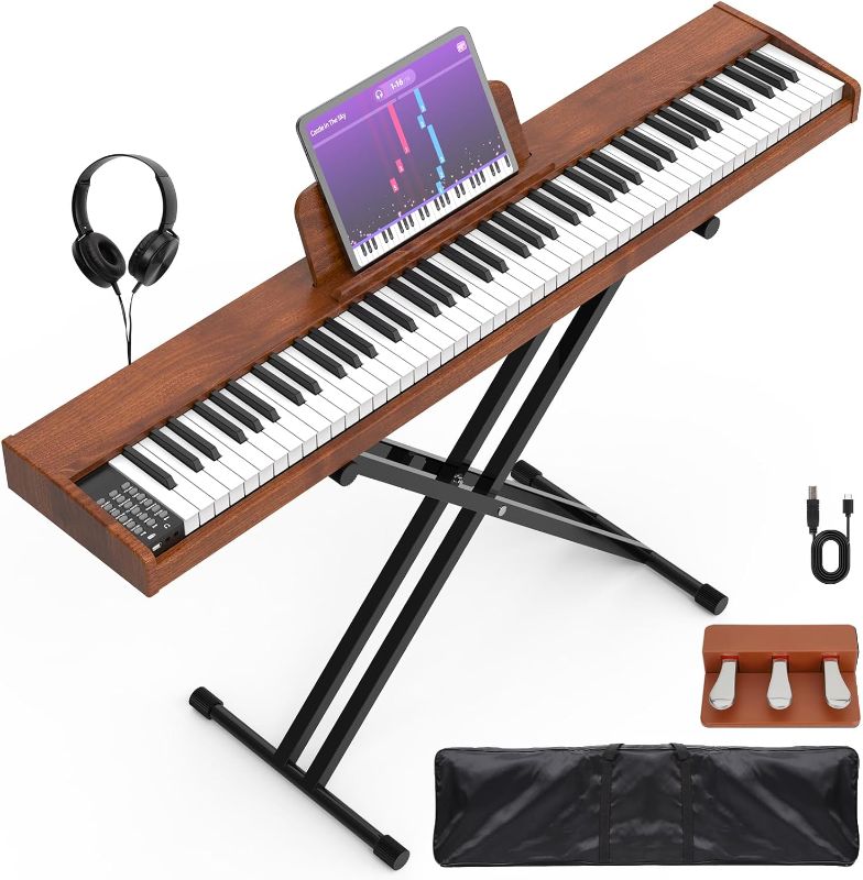 Photo 1 of 88 Key Digital Piano Keyboard,88 Key Full Size Weighted Hammer Action Electric Keyboard Piano with 200 Rhythms,200 Tones, Piano Keyboard with Stand, TriplePedal,Headphone, Carrying Bag