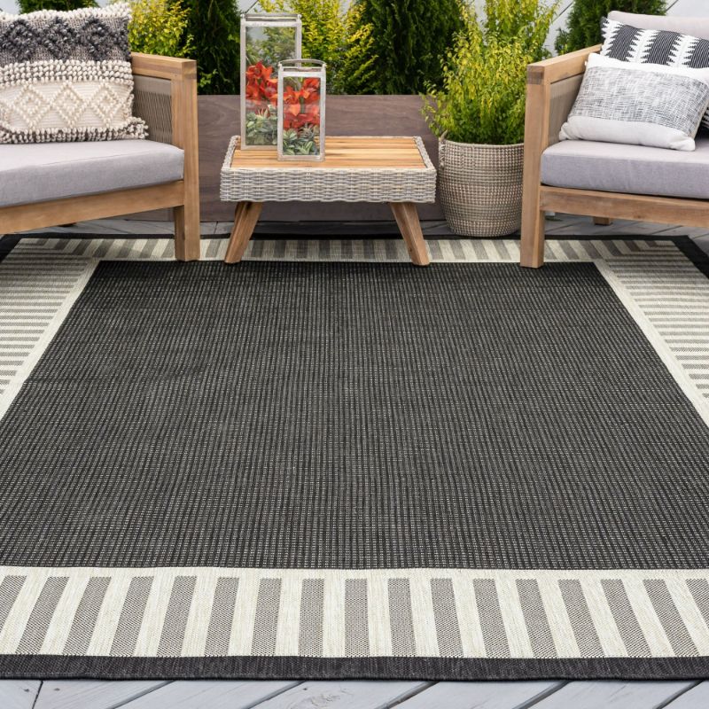 Photo 1 of 8x10 Water Resistant, Large Indoor Outdoor Rugs for Patios, Front Door Entry, Entryway, Deck, Porch, Balcony | Outside Area Rug for Patio | Black, Striped Border | Size: 7'10'' x 10'2''