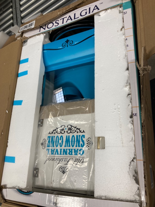 Photo 1 of Nostalgia Snow Cone Shaved Ice Machine - Retro Cart Slushie Machine Makes 48 Icy Treats - Includes Metal Scoop, Storage Compartment, Wheels for Easy Mobility - White, Blue