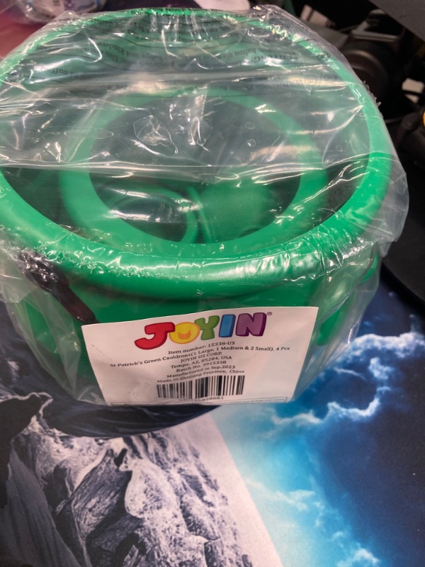 Photo 1 of JOYIN 4PCS St.Patrick's Day Green Cauldrons with Handle Party Supplies Set with 1 Pcs Large, 1 Medium and 2 Small Plastic Lucky Leprechaun Pots