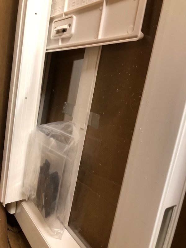 Photo 1 of ***USED - SCRATCHED AND SCRAPED - LIKELY MISSING PARTS - UNABLE TO VERIFY FUNCTIONALITY***
Ideal Pet Products VPPA Vinyl Patio Pet Door with Air Seal, Adjustable Height: 76-3/4" To 78-1/2", Extra Large, 10-1/4" x 15-3/4" Flap Size