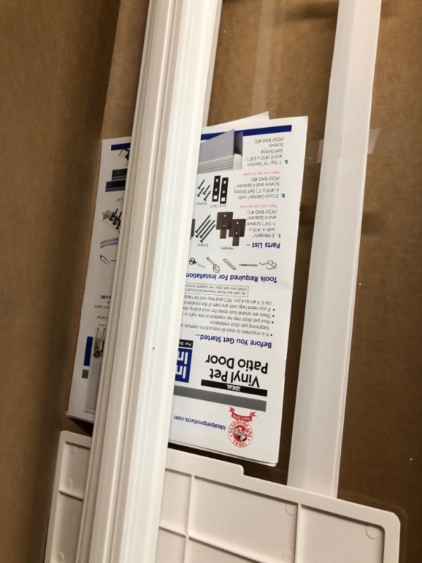 Photo 1 of ***USED - SCRATCHED AND SCRAPED - LIKELY MISSING PARTS - UNABLE TO VERIFY FUNCTIONALITY***
Ideal Pet Products VPPA Vinyl Patio Pet Door with Air Seal, Adjustable Height: 76-3/4" To 78-1/2", Extra Large, 10-1/4" x 15-3/4" Flap Size