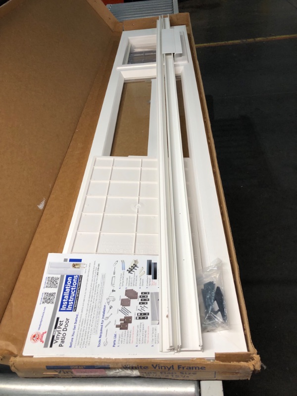Photo 1 of ***USED - SCRATCHED AND SCRAPED - LIKELY MISSING PARTS - UNABLE TO VERIFY FUNCTIONALITY***
Ideal Pet Products VPPA Vinyl Patio Pet Door with Air Seal, Adjustable Height: 76-3/4" To 78-1/2", Extra Large, 10-1/4" x 15-3/4" Flap Size