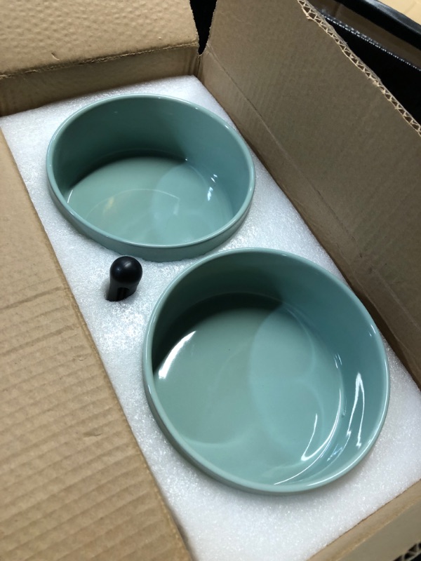 Photo 2 of **LIKE NEW
SPUNKYJUNKY Ceramics Raised Dog Bowls with Wooden Stand Elevated Bowls for Small Medium Dog Food and Water Pet Feeding Bowl(Double 28.7OZ Bowls,Light Green)