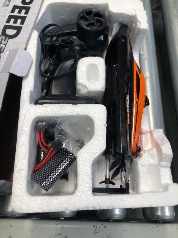 Photo 2 of *USED MISSING PARTS*RC Boat with 2 Rechargeable Battery, 20+ MPH Fast Remote Control Boat for Pools and Lakes, 2.4G RC Boats Pool Toys for Adults and Kid (812-Orange)