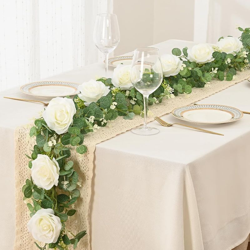 Photo 1 of  ***STOCK PHOTO FOR REFERENCE ONLY*** Dolicer 2Pcs 13Ft Artificial Eucalyptus Garlands with Flowers - 8 Roses, Faux Floral Greenery Garlands Fake Flowers Vines for Wedding Table Centerpieces Arch Party Ceremony Backdrop Decor (White)