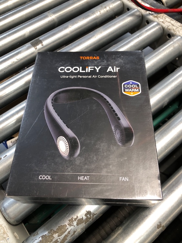 Photo 2 of ***FACTORY SEALED****TORRAS [COOLiFY Air?2024 Upgrade Neck Air Conditioner, Ultra-Light Portable Neck Fan Rechargeable, Personal Cooling Device Neck Fans that blow cold air with 3 Modes Fan/Cooler/Heat, Black