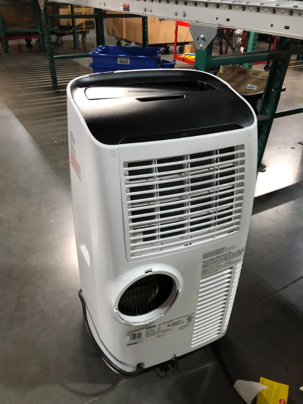 Photo 9 of ***USED - MAJOR DAMAGE - SEE COMMENTS***
De'Longhi 14000 BTU Portable Air Conditioner, Dehumidifier & Fan + Cool Surround Remote w/Built-in Temperature Control Sensor & Quiet Mode, 700 sq ft, XLarge Room, Pinguino 8600 BTU (DOE), White