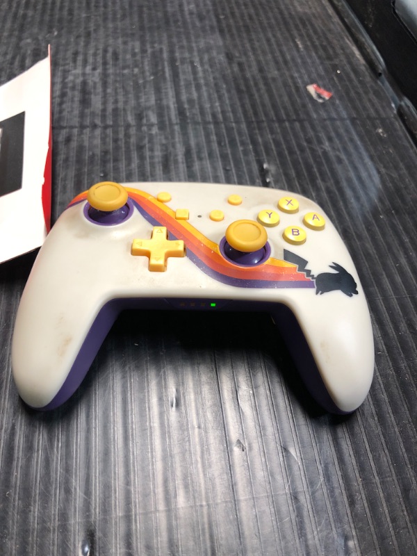 Photo 2 of **USED -DIRTY**
PowerA Enhanced Wireless Controller for Nintendo Switch - Pokémon: Pikachu Retro, Bluetooth controller