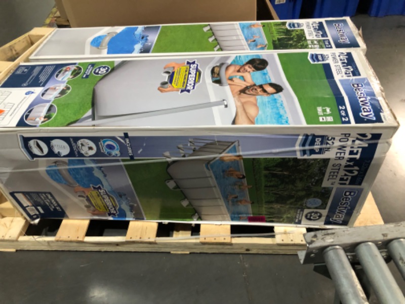 Photo 2 of `**On pallet pick up by truck only 
24 ft. x 12 ft. Rectangular 52 in. Deep Metal Frame Above Ground Swimming Pool Set