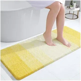 Photo 1 of ***STOCK PHOTO REFERENCE ONLY***General post 
Bathroom fluffy mat white and goldish color 