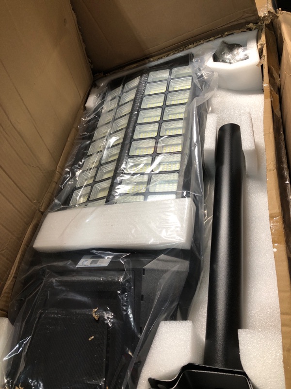 Photo 2 of ***Parts Only***Jadisi 2-Pack 8000W Solar Street Light - 600000 Lumens, Dusk-to-Dawn, Waterproof, Ideal for Commercial & Outdoor Parking Lots - Energy-Efficient Solar-Powered, 3-Year Warranty