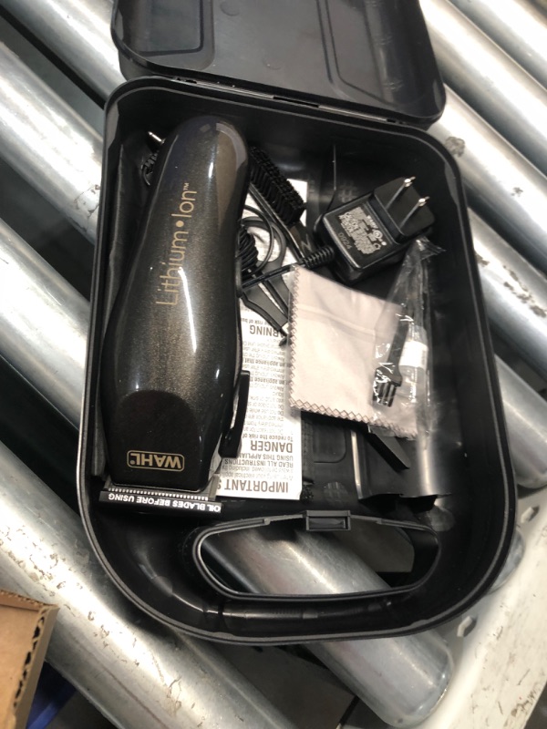 Photo 5 of ***USED - LIKELY MISSING PARTS - UNABLE TO VERIFY FUNCTIONALITY***
Wahl Clipper Lithium-ion Cordless Haircutting Kit 79608 Cordless Rechargeable Grooming and Trimming Kit, 12 Guide Combs