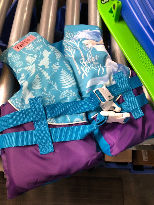 Photo 1 of SwimWays Disney Princess Swim Trainer Life Jacket, US Coast Guard Approved Life Vest Kids Swim Vest, Pool Floats & Life Jackets for Kids 33-55 lbs, Elsa