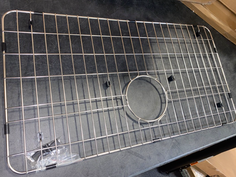 Photo 2 of MONSINTA Stainless Steel Sink Grid and Protectors for Bottom of Kitchen Sink, 26" x 14" with Rear Drain for Single Sink Bowl
