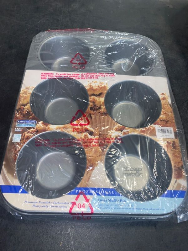 Photo 2 of Giant Muffin Pan Cup: 3¾ in x 1¾ in (9.5 cm x 4.4 cm) EXCLUSIVE nonstick surface ensures easy cleanup. Metal tools are sate to use.