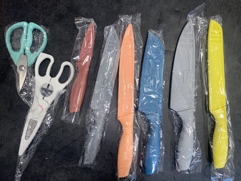 Photo 2 of BergHOFF 15Pc Multicolor Knife Set Stainless Steel Nonstick Coated Blade, Each With Protective Sleeve Cover.
