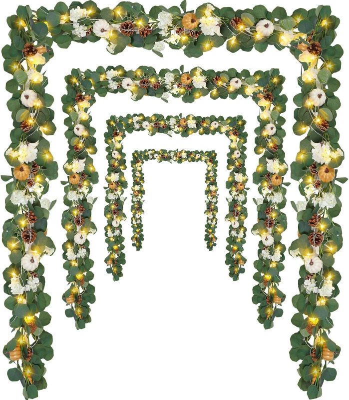 Photo 1 of Ceenna 4 Pack Pumpkin Garlands 6.3ft Artificial Lighted Eucalyptus Garland with Pumpkins Pinecones Berries White Flowers Fall Garland for Wedding Fall Thanksgiving Table Runner Farmhouse Pumpkin Decor