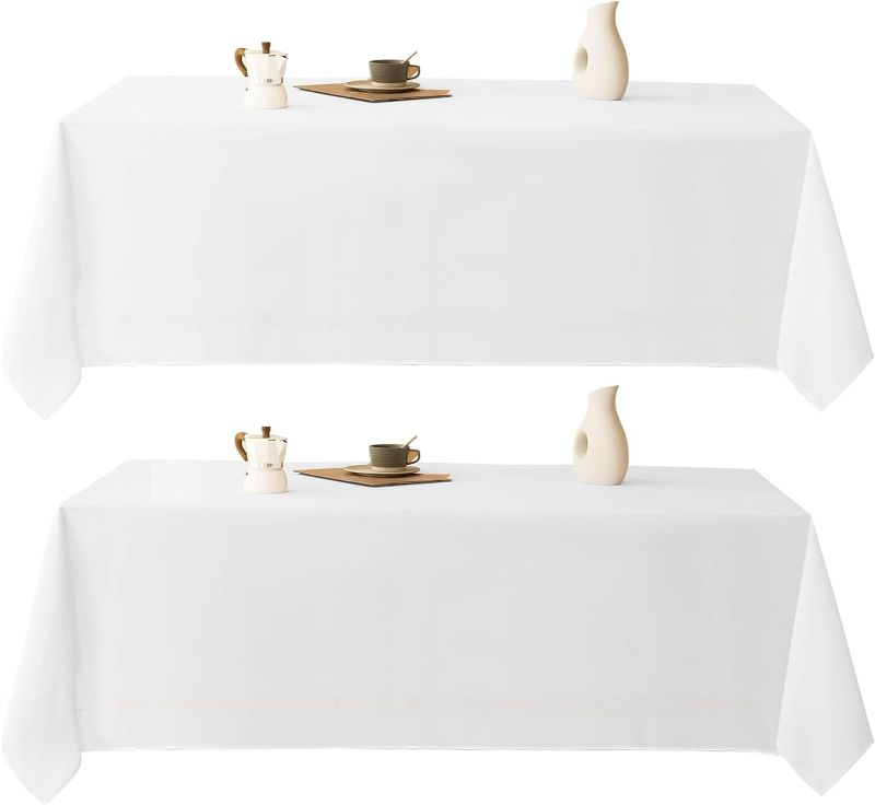 Photo 1 of Aocoz White Tablecloth 90x132 Inch 2 Pack Rectangle Tablecloths Stain Resistant Decorative Washable Polyester Table Cloth for Dining Table Banquets Buffet Parties and Wedding White [2 Pack ] 90*132