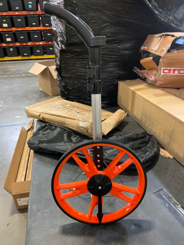 Photo 3 of VEVOR Measuring Wheel in Feet or Meters,12.5 in Wheel Diameter, 40.94-27.95 in Telescoping Measure Wheel, Measurement 0-9,999ft/m with Back Bag, Suitable for Lawn/Hard/Soft/Wood Road Measuring
