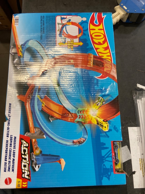 Photo 2 of Hot Wheels Massive Loop Mayhem Track Set with Huge 28-Inch Tall Track Loop Slam Launcher, Battery Box & 1 Hot Wheels 1:64 Scale Car, Designed for Multi-Car Play, Gift for Kids 5 Years Old & Up SIOC/FFP Track Set
