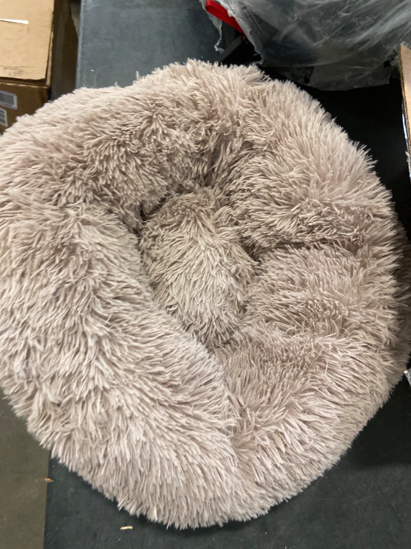 Photo 2 of WESTERN HOME WH Calming Dog & Cat Bed, Anti-Anxiety Donut Cuddler Warming Cozy Soft Round Bed, Fluffy Faux Fur Plush Cushion Bed for Small Medium Dogs and Cats (20"/24"/27"/30")
