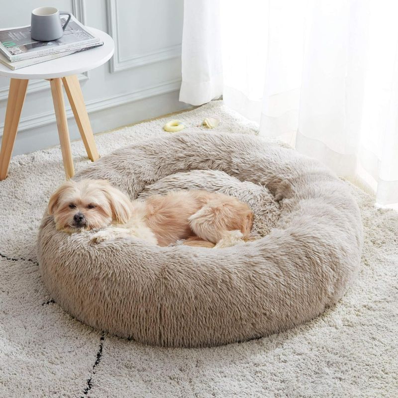 Photo 1 of WESTERN HOME WH Calming Dog & Cat Bed, Anti-Anxiety Donut Cuddler Warming Cozy Soft Round Bed, Fluffy Faux Fur Plush Cushion Bed for Small Medium Dogs and Cats (20"/24"/27"/30")
