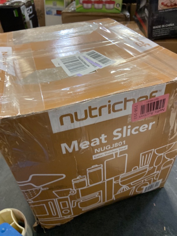 Photo 1 of Nutrichef Electric Meat Slicer | 200W Automatic Meat, Deli & Bread Slicer | Adjustable Dial for 0-15mm Cutting Range Thickness | Removable 7.5 IN Stainless Steel Blade & Food Pusher for Safety (Black)
